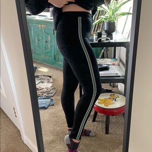 Black jeans with blue and green side stripe